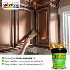 Hand painting kitchen cabinets with metallic gold paint, showcasing heat-resistant, easy-clean finish for home renovation.