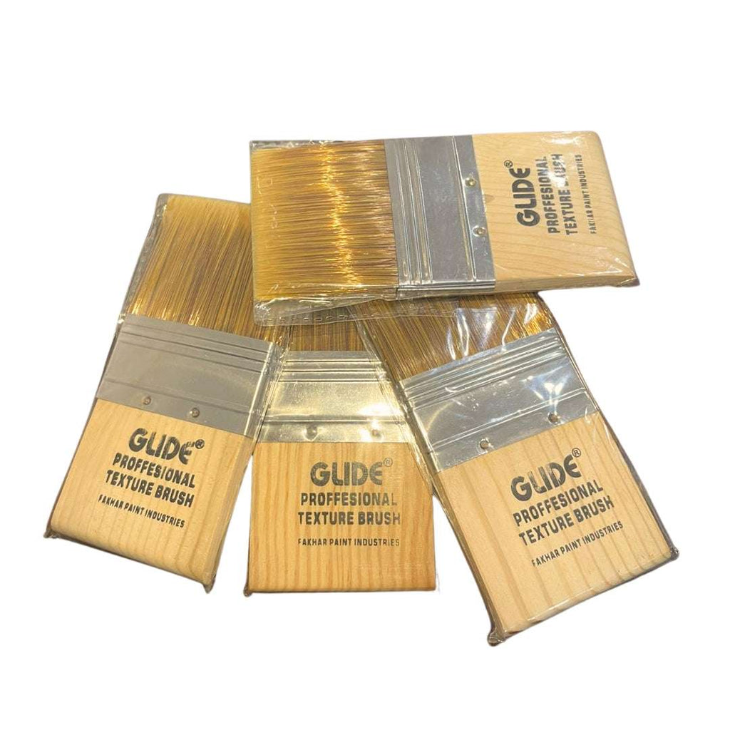 Glide Professional Texture Paint Brushes with wooden handles and golden bristles, ideal for wall painting projects.