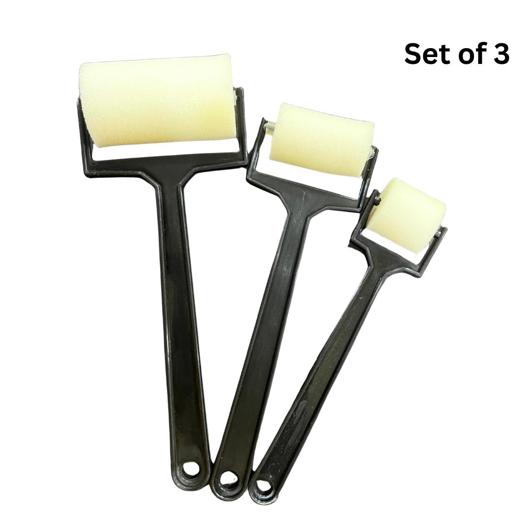 Set of 3 foam paint rollers with black handles for smooth wall painting
